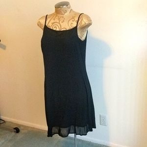 Short black dress with sheer material around neck in front and back